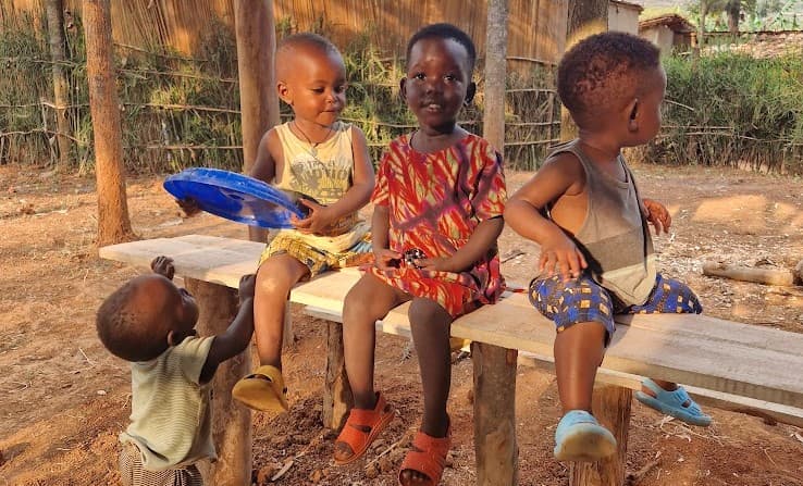 Manzi and his friends playing together at Nyankora Kids